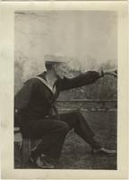  [Study for World War One poster depicting sailor sitting in a field pointing]