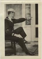 [Study for World War One poster depicting sailor sitting on a porch pointing]