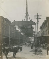 Progress of steel construction in Front St. at bent #40 looking south, May 1, 1916.