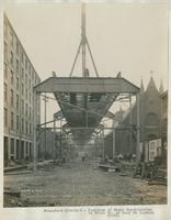 Progress of steel construction in Front St. at bent 99, looking south, June 19, 1916. [including Immaculate Conception R.C. Church, at Allen St., two blocks bel. Girard Ave.]