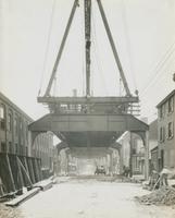 Progress of steel construction in Front St. at bent #108, looking south, June 26, 1916.