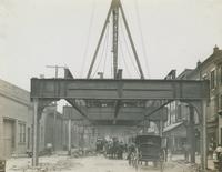 Progress of steel construction in Front St. at bent #121, looking south, July 31, 1916.