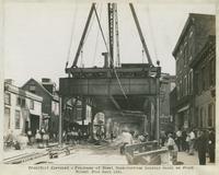 Progress of steel construction, looking south on Front St. from Bent 155, August 14, 1916.