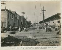 Progress of steel construction, looking north on Front St. from bent 167, showing crosswires, August 28, 1916.