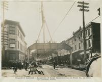 Progress of steel construction in Front St. at bent 211, looking south, September 18, 1916.