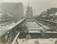 Progress of reinforced concrete roadbed construction in Front St. at Green St. looking south, December 17, 1917.