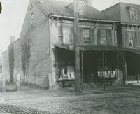 5203-5205 Main St. Home of Dr. Theodore Ashmead and Dr. Belton. Owen Wister born here July 14,1860.