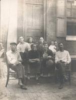 Men playing cards on stoop, Philadelphia.