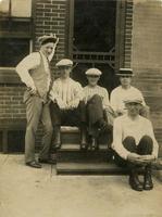 Five men at wooden stoop, Philadelphia.