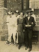 Group of teenagers standing in front of a stone porch, Philadelphia.