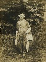 Native American woman standing in wooded area, Philadelphia.