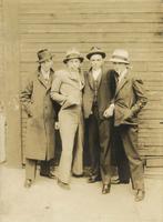 Four young men posing as gangsters, Philadelphia.