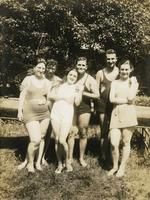 Three couples in bathing suits in woodland, Philadelphia.