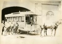 [J.H. Davis driving a horsecar out of a carbarn, Fifth & Sixth Street line, Fifth & Jackson Streets, Philadelphia.]