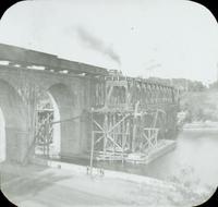 [Connecting Railway Bridge over the Schuylkill River near Girard Avenue, showing the installation of the Pratt truss, October 1897.]