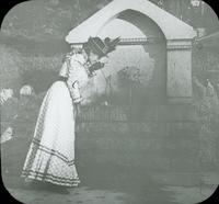 [Catharine Rupp Doering drinking from fountain along the Wissahickon Creek.]