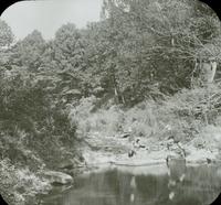 [Jules and Bill Doering crossing water on stepping stones, Pocono Mountains, Pa.]