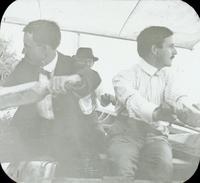 [Men rowing a sailboat in the Chesapeake Bay.]