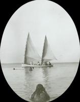 [Bathers near a canoe in the Chesapeake Bay.]