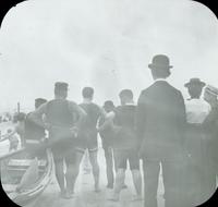 [Crowd standing on the beach looking toward the ocean, Atlantic City, N.J.]
