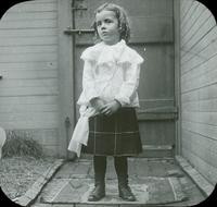 [Albert Lindsay Doering standing in the backyard of the family residence, 1837 N. Bouvier Street, Philadelphia.]