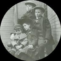 [Children sitting in the backyard of the Doering residence, 1837 N. Bouvier Street, Philadelphia.]