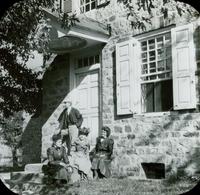 [Group sitting on steps of Washington's Headquarters, Valley Forge, Pa.]