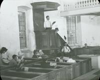 [Interior of the Old Trappe Church, showing a minister directing the religious service, Trappe, Pa.]