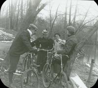 [Bicycling trip along the Schuylkill Canal, group with Catharine Rupp Doering resting near the canal.]