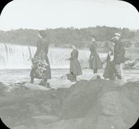 [Flat Rock Dam, group standing on rocks near the water, Philadelphia.]