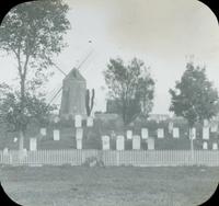 [Cemetery, with distant view of windmill, Long Island, N.Y.]