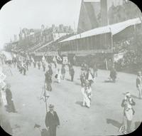 [Peace Jubilee parade, people marching in costumes in front of Keneseth Israel Temple, 1717 North Broad Street, Philadelphia.]