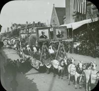 [Peace Jubilee parade, portraits trimmed with loaves of bread on Freihofer's Bakery float, in front of Keneseth Israel Temple, 1717 North Broad Street, Philadelphia.]