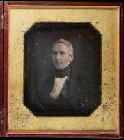 [Portrait of seated unidentified man.]