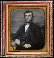 [Portrait of a wide eyed, handsome, unidentified young man.]