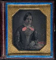 [Portrait of an unidentified young woman wearing a dark, taffeta dress with a crossed collar.]