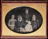 [Unidentified family portrait including three women of various ages, a young girl and a baby.]