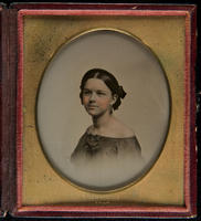 [Vignette portrait of young woman in off the shoulder dress]