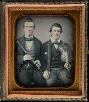 [Portrait of two unidentified male musicians holding their instruments, a flute and a violin.]