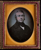 [Portrait of an unidentified man with curled hair down his cheeks, looking slightly to his left.]