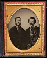 [Portrait of two seated men]